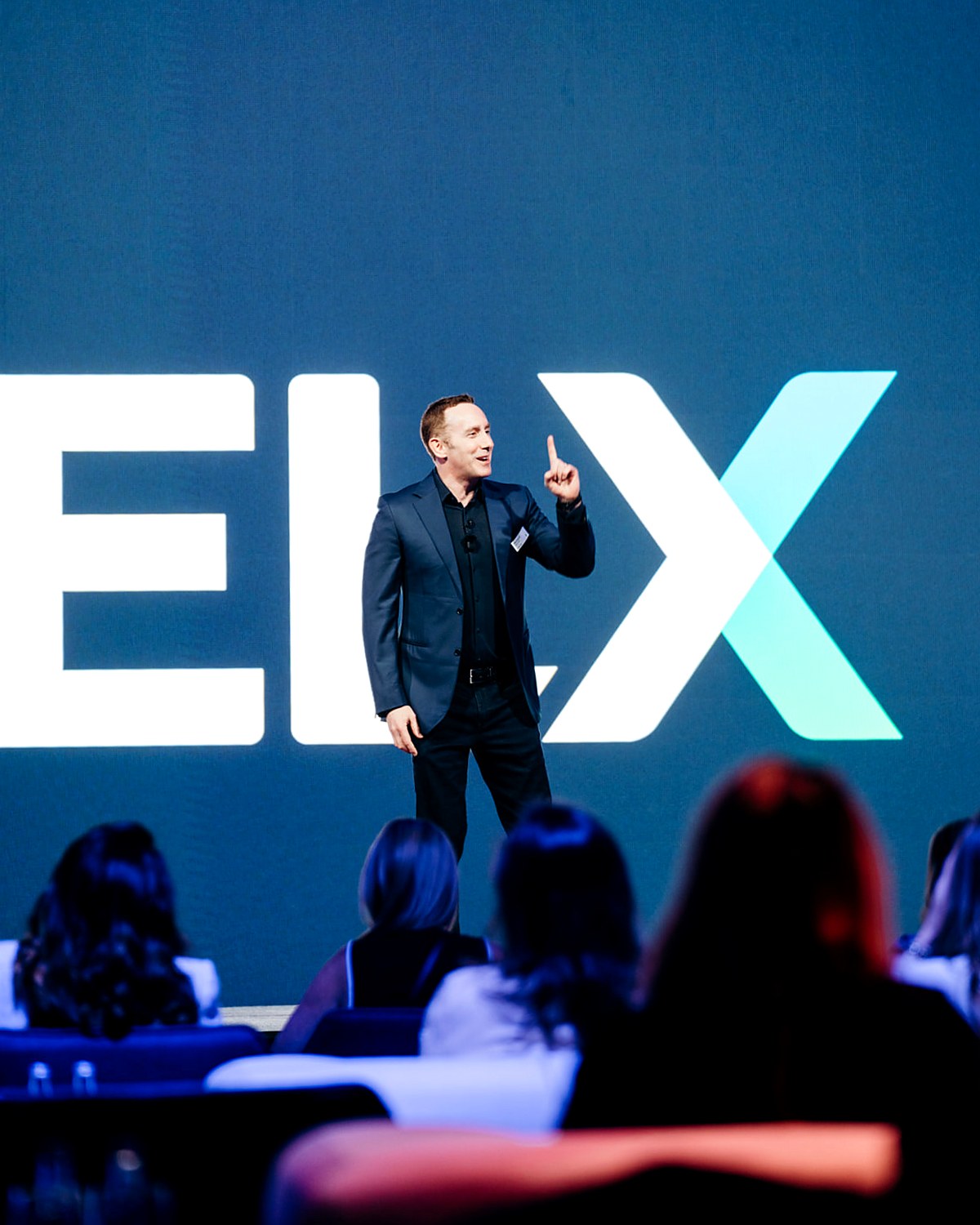 Executive on stage